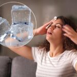 Donna che si asciuga sudore e ghiaccio